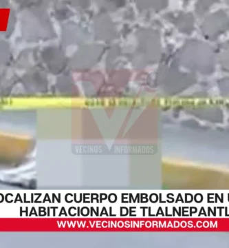 Localizan cuerpo embolsado en unidad habitacional de Tlalnepantla