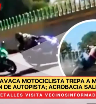 Motociclista trepa a muro de contención de autopista; acrobacia sale mal |VIDEO