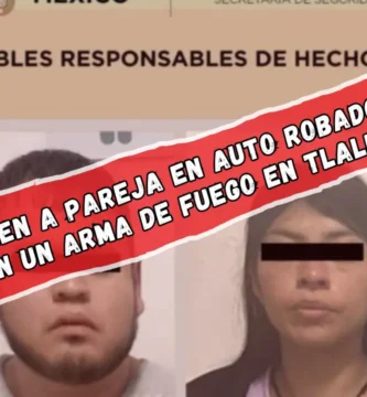 Detienen a pareja en auto robado y le aseguran un arma de fuego en Tlalnepantla